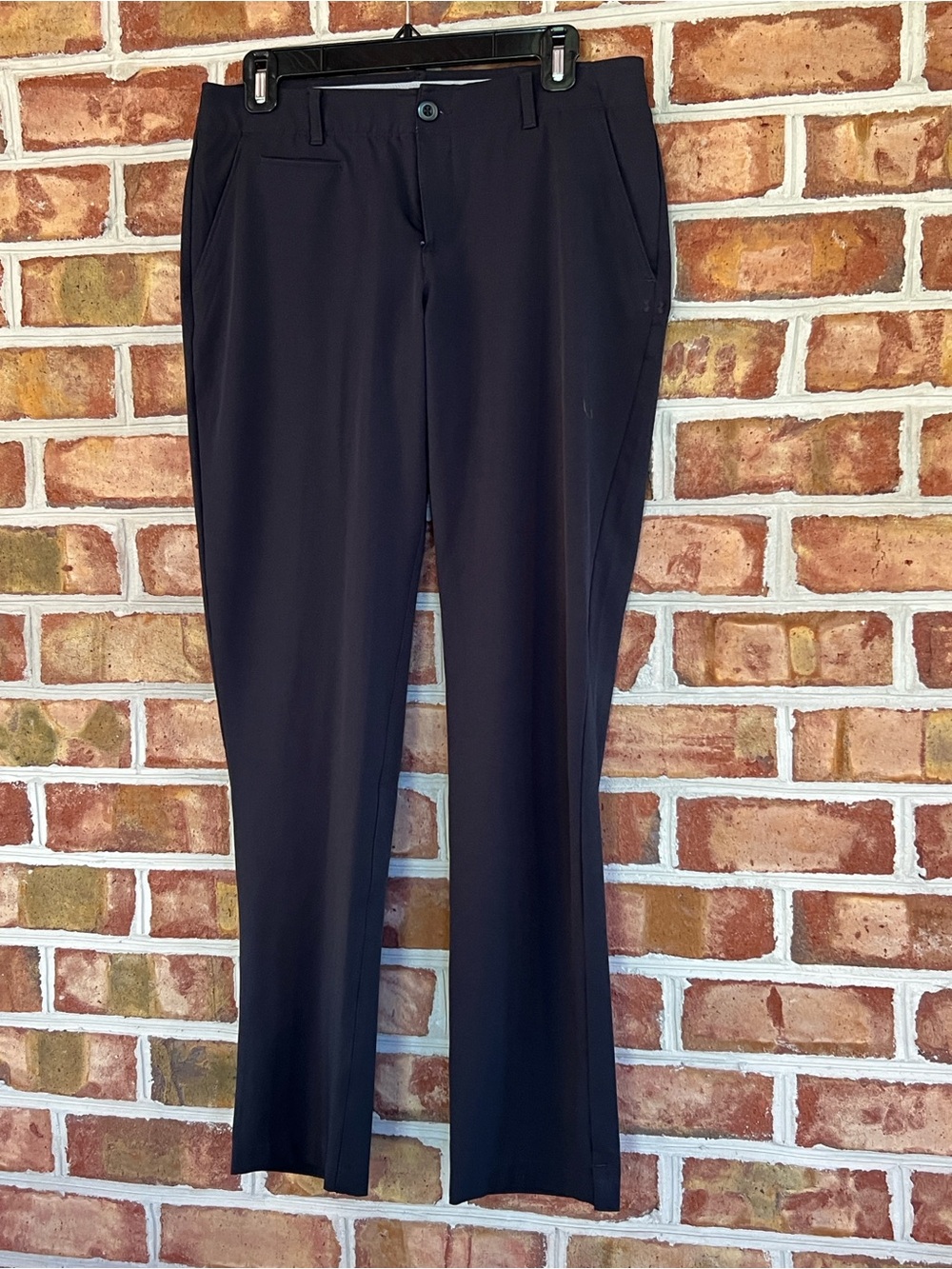 Under Armour Women's fitted Straight Leg stretch Pants in Black. 8